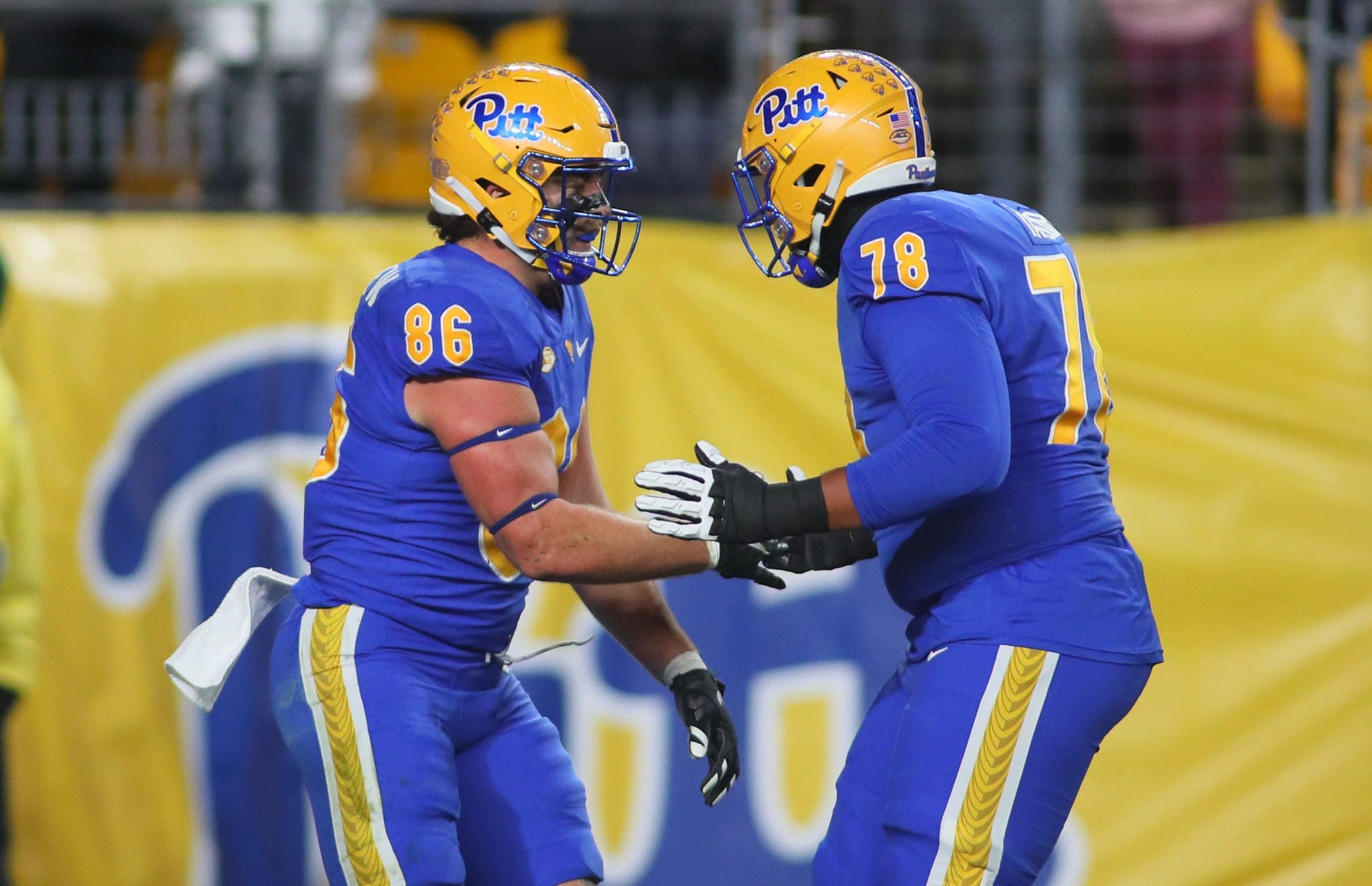 Pitt Panthers tight end Gavin Bartholomew (86) celebrates his touchdown with offensive lineman Branson Taylor (78) during the first half against the Georgia Tech Yellow Jackets at Acrisure Stadium in Pittsburgh, PA on October 1, 2022. (Michael Longo/PSN)