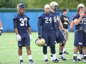 Connor James and Qadree Ollison watch during the first day of practice (Photo by: David Hague)