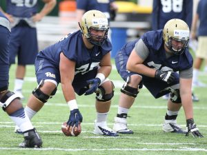 Connor Dintino snaps the ball during the first day of practice (Photo by: David Hague)
