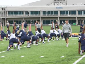Pitt stretches on the opening practice. (Photo by: David Hague)