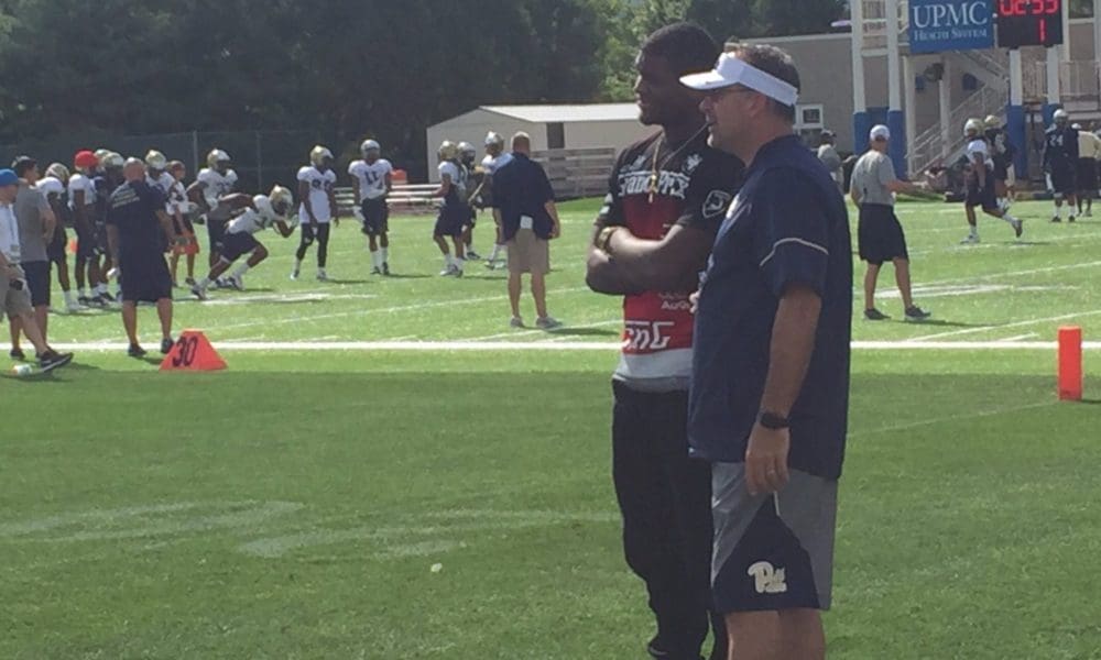 Donovan Jeter chats with Pitt head coach Pat Narduzzi (Photo credit: Alan Saunders)