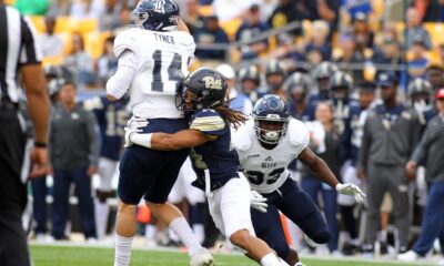 Avonte Maddox (14) causes Jackson Tyler (14) to fumble September 30, 2017 -- David Hague