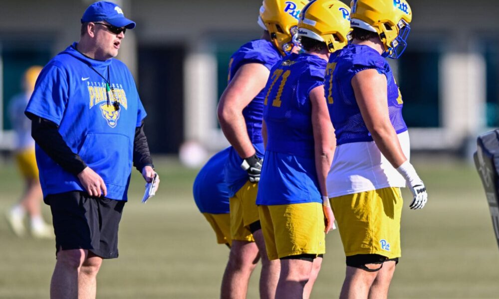 Pitt offensive line coach Jeremy Darveau coaching up his unit during spring practice. March 11, 2025 / Ed Thompson. PSN.