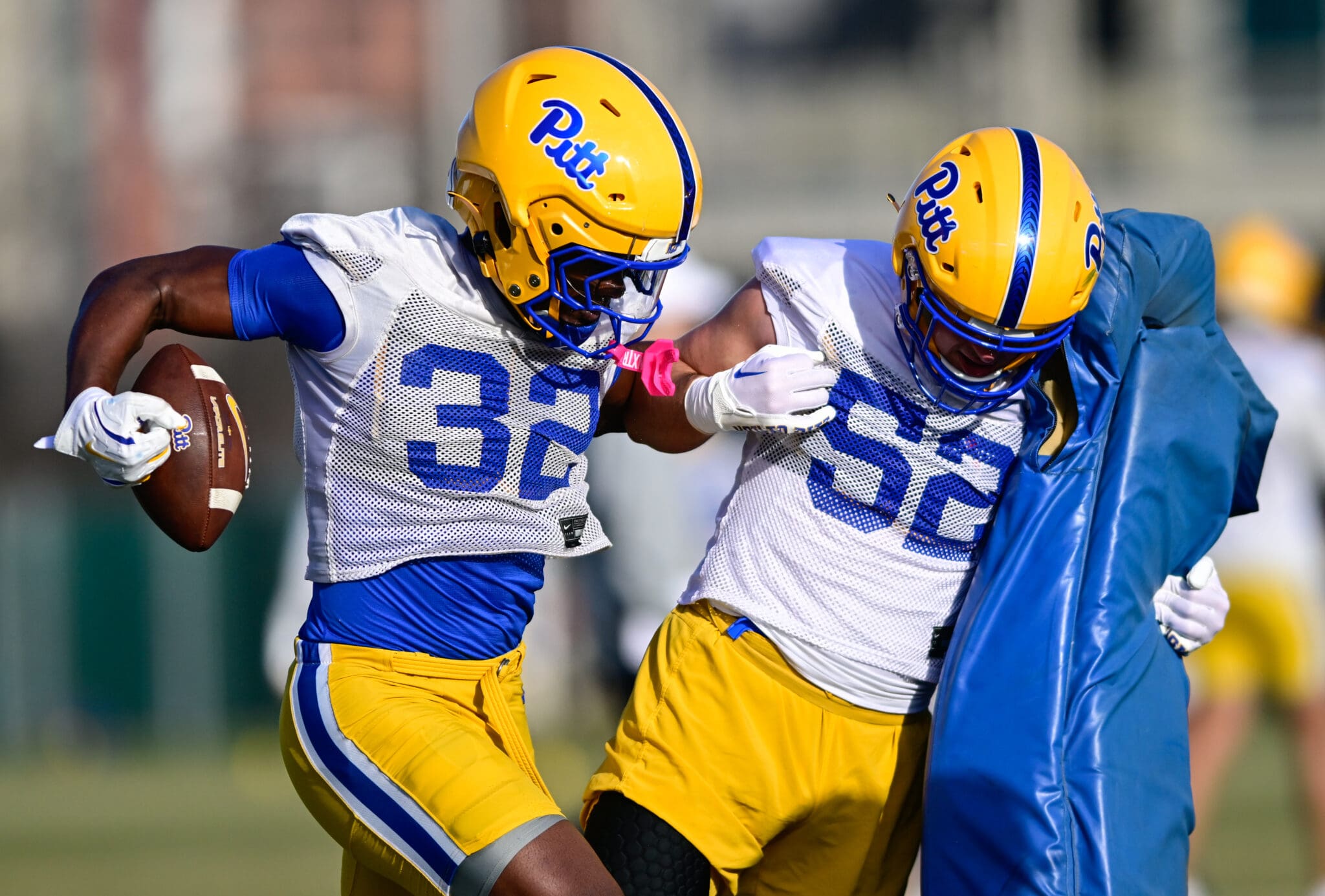 Pitt sophomore linebacker Jeremiah Marcelin (32) works with Abe Ibrahim (52) at spring practice on March 13, 2025 / Ed Thompson. PSN