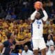 Pitt basketball player Blake Hinson shoots a jump-shot against UT Martin.