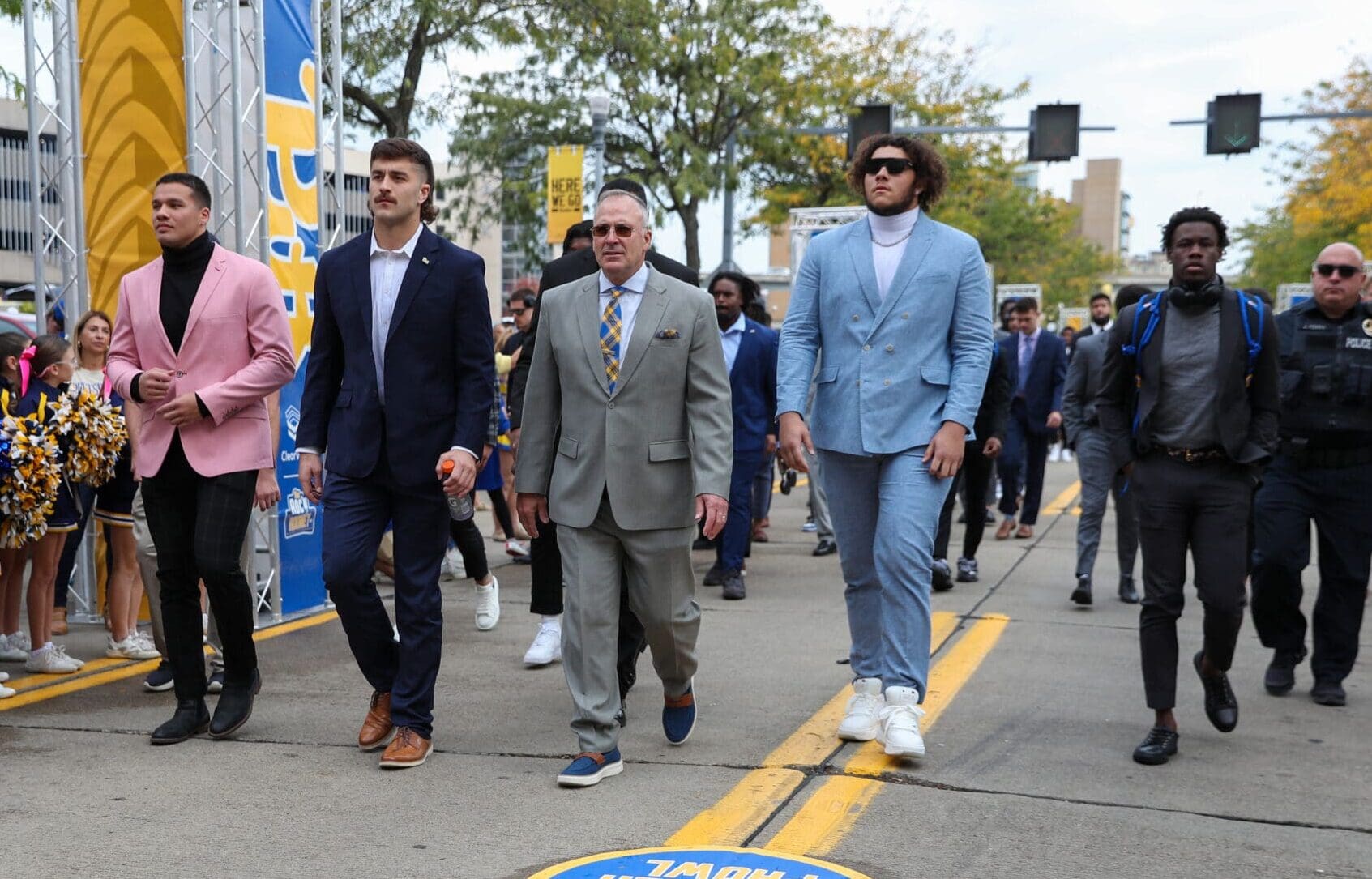 Pitt football walks in the Panther Prowl. (Left to right) Brandon George, Gavin Bartholomew, head coach Pat Narduzzi, Branson Taylor and Konata Mumpfield. October 12, 2024 / David Hague. PSN.
