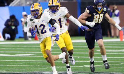 Pitt Panthers safety Cruce Brookins (12) runs after an interception. December 26, 2024 David Hague/PSN