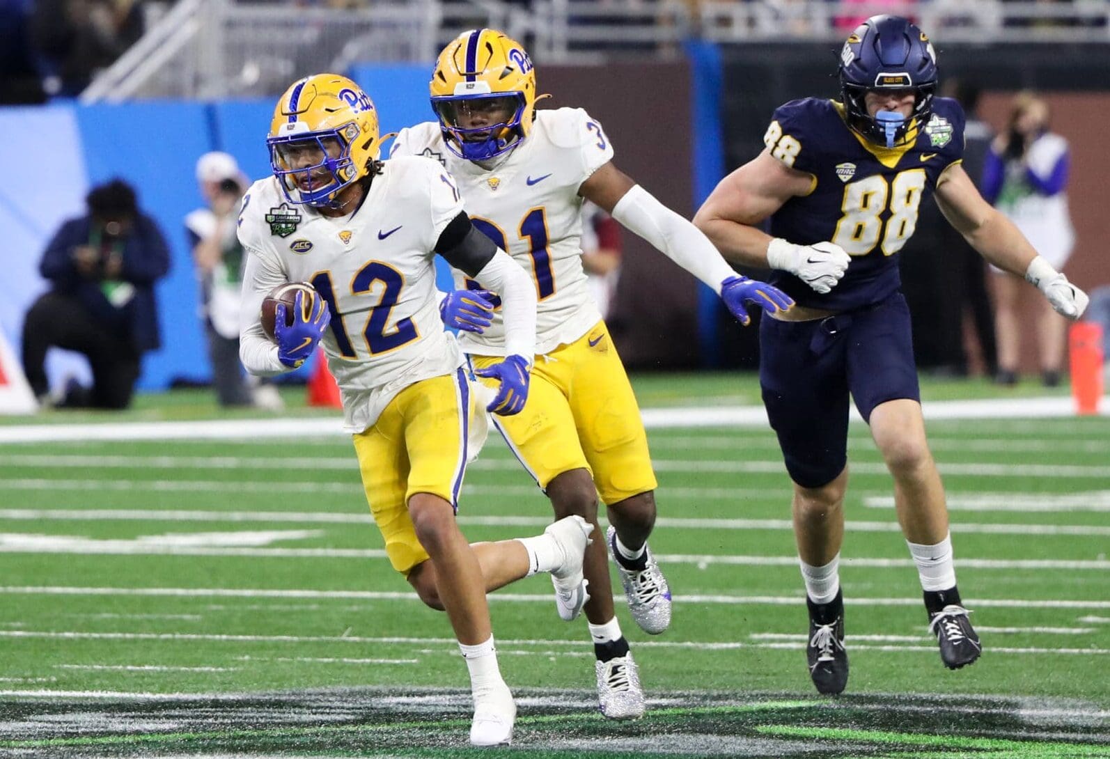 Pitt Panthers safety Cruce Brookins (12) runs after an interception. December 26, 2024 David Hague/PSN