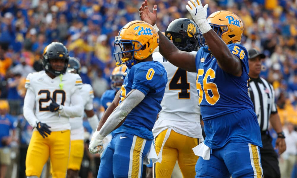 Pitt Panthers running back Desmond Reid (0) and center Lyndon Cooper (56) October 12, 2024 David Hague/PSN