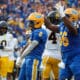 Pitt Panthers running back Desmond Reid (0) and center Lyndon Cooper (56) October 12, 2024 David Hague/PSN