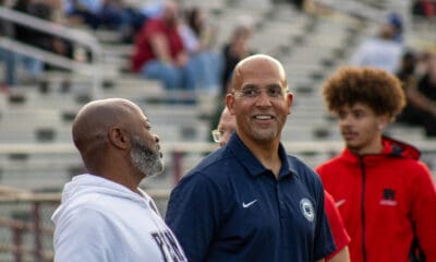 Penn State head coach James Franklin and assistant Terry Smith attending WPIAL action