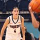 Duquesne women's basketball guard Megan McConnell defending against Saint Francis. Photo via George Michalowski.