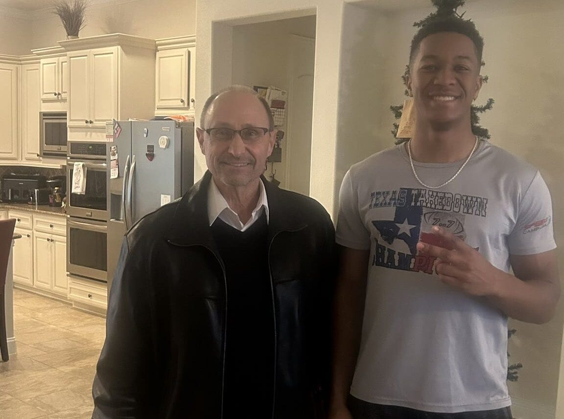 Pitt cornerback target Isaiah McMillian with defensive coordinator Randy Bates. Photo courtesy of McMillian's X account.