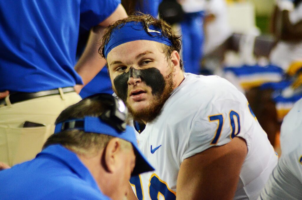 Pitt offensive lineman Ryan Baer listens to his coaches as the Panthers play Virginia Tech on Saturday, Sept. 30, 2023 in Blacksburg, Virginia. (Mitchell Northam / Pittsburgh Sports Now.)