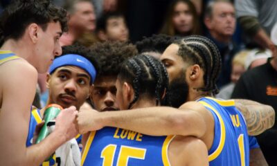 Pitt players huddled up during a break as they played against Duke on Jan. 7, 2025, in Cameron Indoor Stadium in Durham, N.C. (Mitchell Northam / Pittsburgh Sports Now)