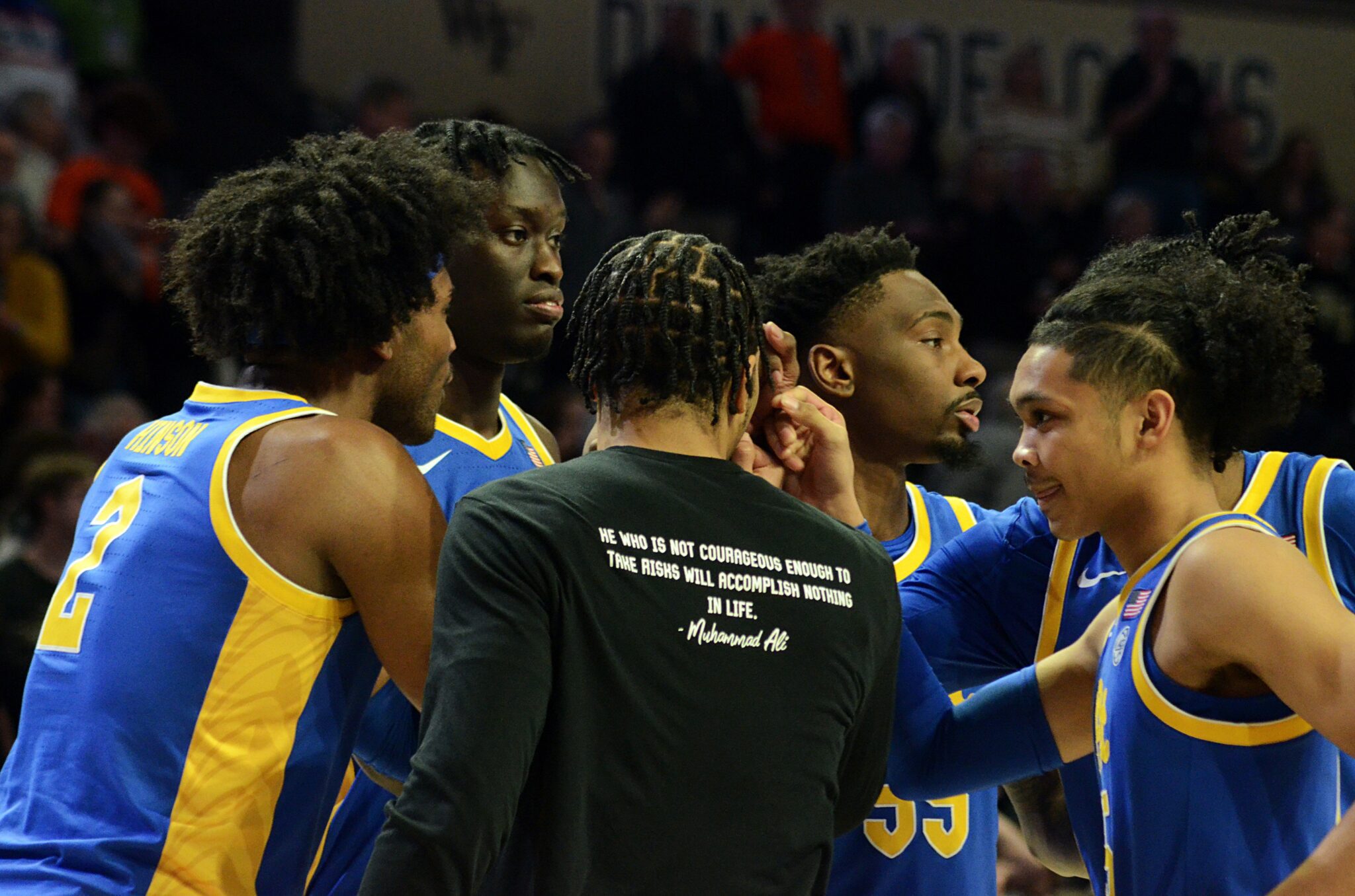 Pitt basketball huddles before playing against Wake Forest on Tuesday, Feb. 20, 2024, in Winston-Salem, N.C. (Mitchell Northam / Pittsburgh Sports Now)