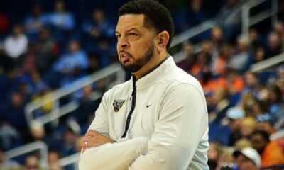 Jeff Capel watches during Pitt's ACC Tournament game vs. Georgia Tech in Greensboro, N.C. on March 8, 2023. (Mitchell Northam / Pittsburgh Sports Now)