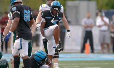 Zykir Moore (7) of Woodland Hills celebrate a tackle against Penn-Trafford. September 8, 2023 -- Jared Todhunter/PSN