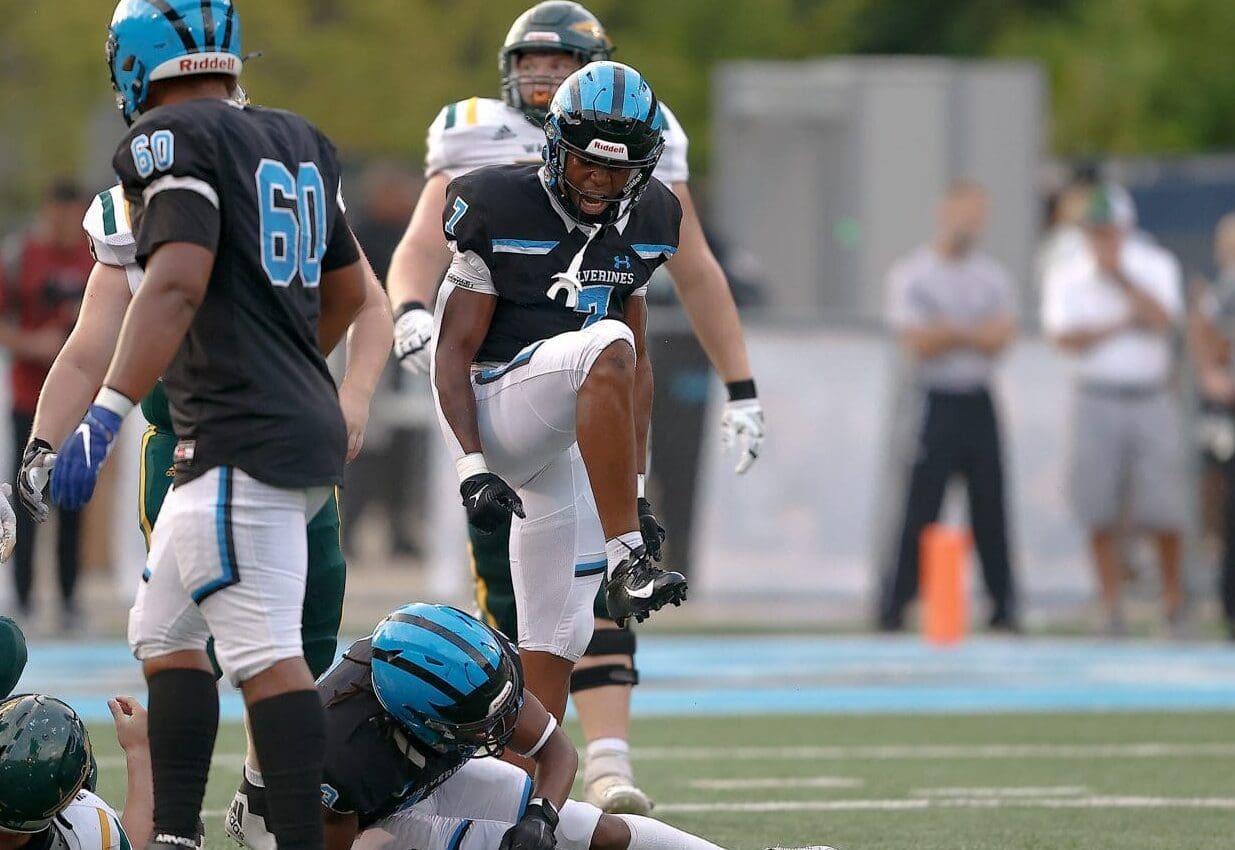 Zykir Moore (7) of Woodland Hills celebrate a tackle against Penn-Trafford. September 8, 2023 -- Jared Todhunter/PSN