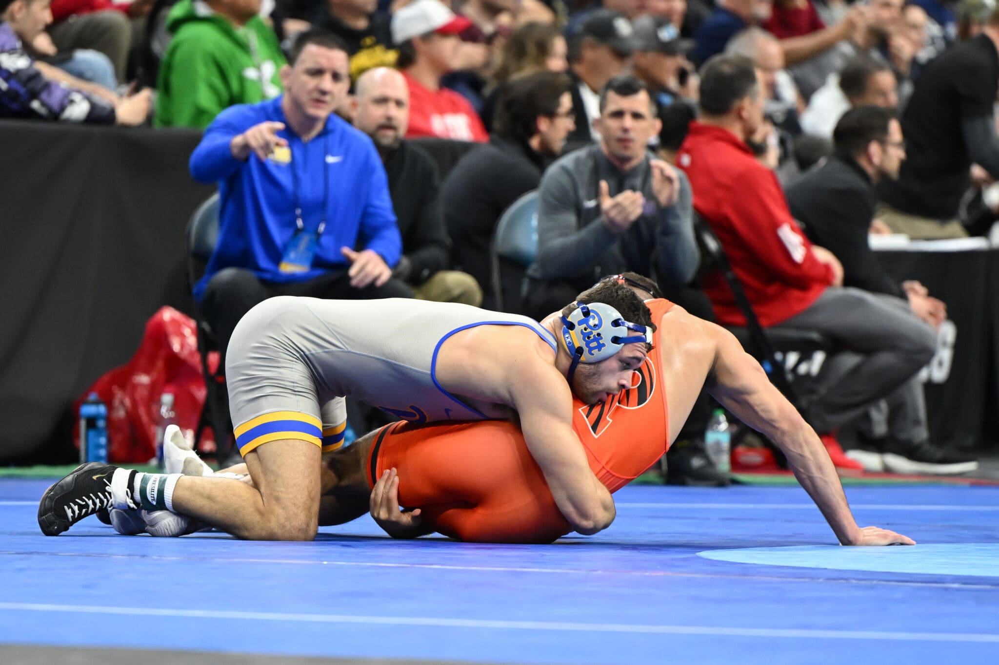 Mac Stout (Pitt) wrestles brother Luke Stout (Princeton) at NCAA championships. Photo courtesy of Pitt Athletics.