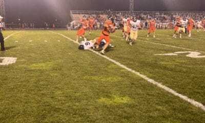 Greater Latrobe quarterback John Wetzel scrambles in the third quarter of Kiski's win.